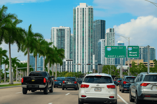 Traffic in downtown Miami with high-rises in view—a perfect setting for local advertising that meets people where they are.